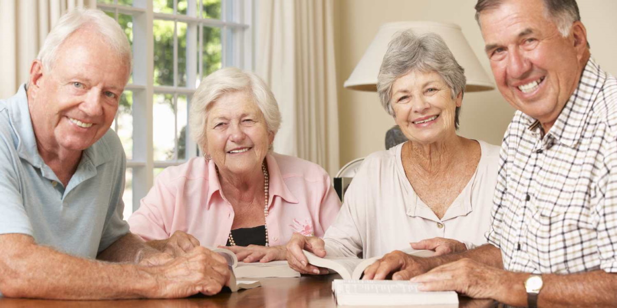 Two employees standing in front of their coffee shop